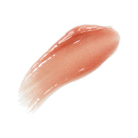Sheer warm-golden Mango Vanilla Juicy Bloom Gloss swatch with reflective shimmer
